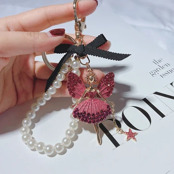 Nove ustvarjalne malo angel keychain girls moda vrečko okraski pearl verige ballet dekle keychain nosorogovo lepe avto keychai